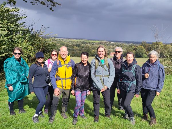 A group of Ramblers wearing coats on an autumn day.